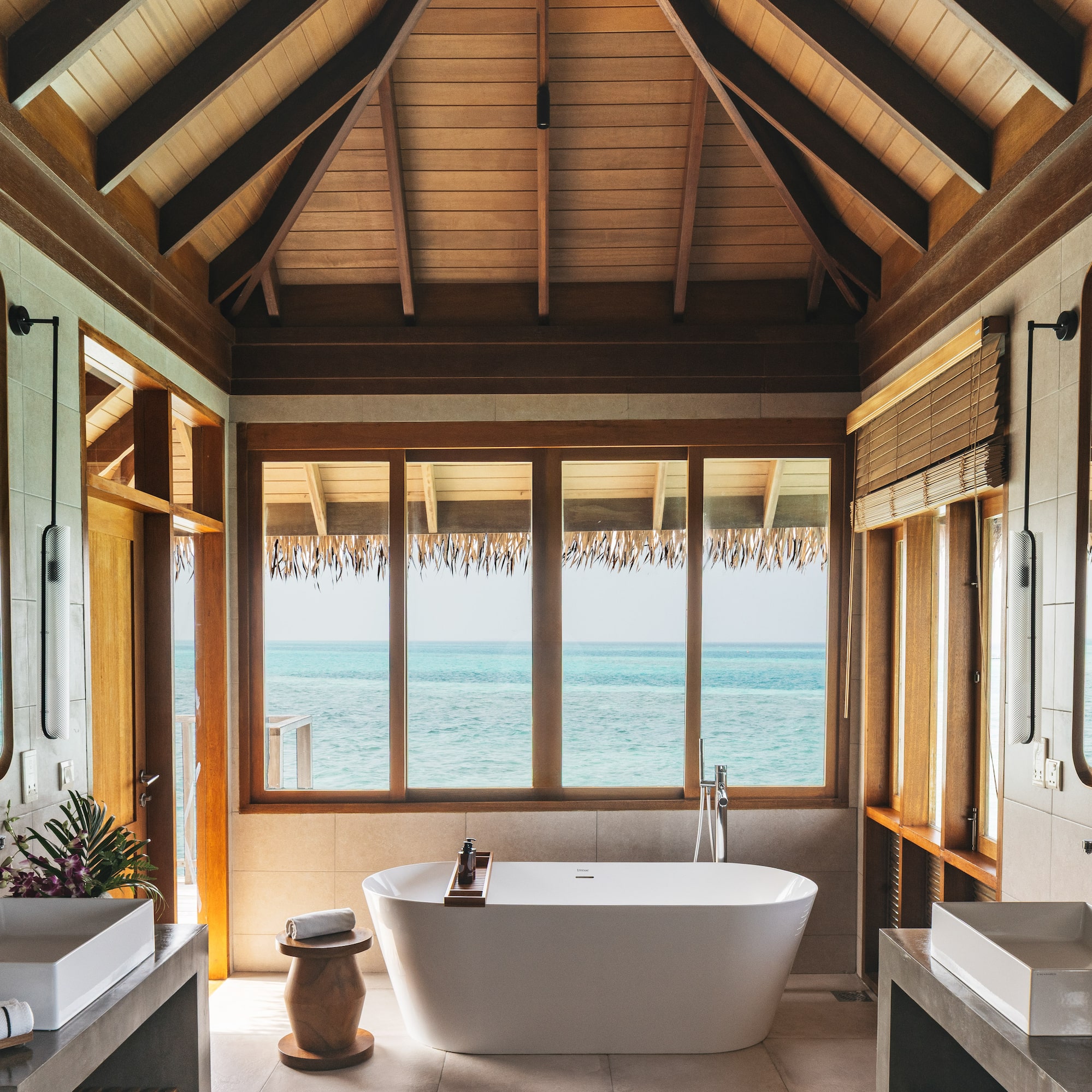 a bathroom with a tub and sink