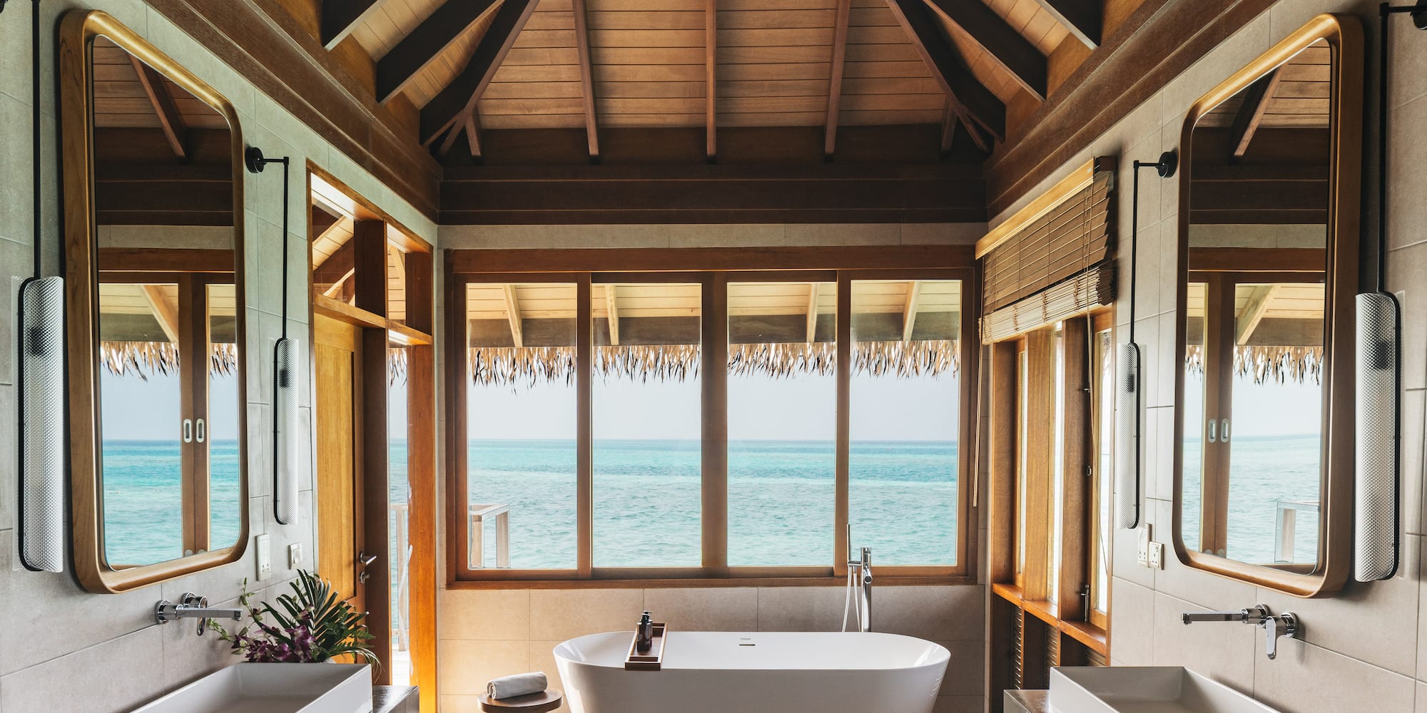 a bathroom with a tub and sink