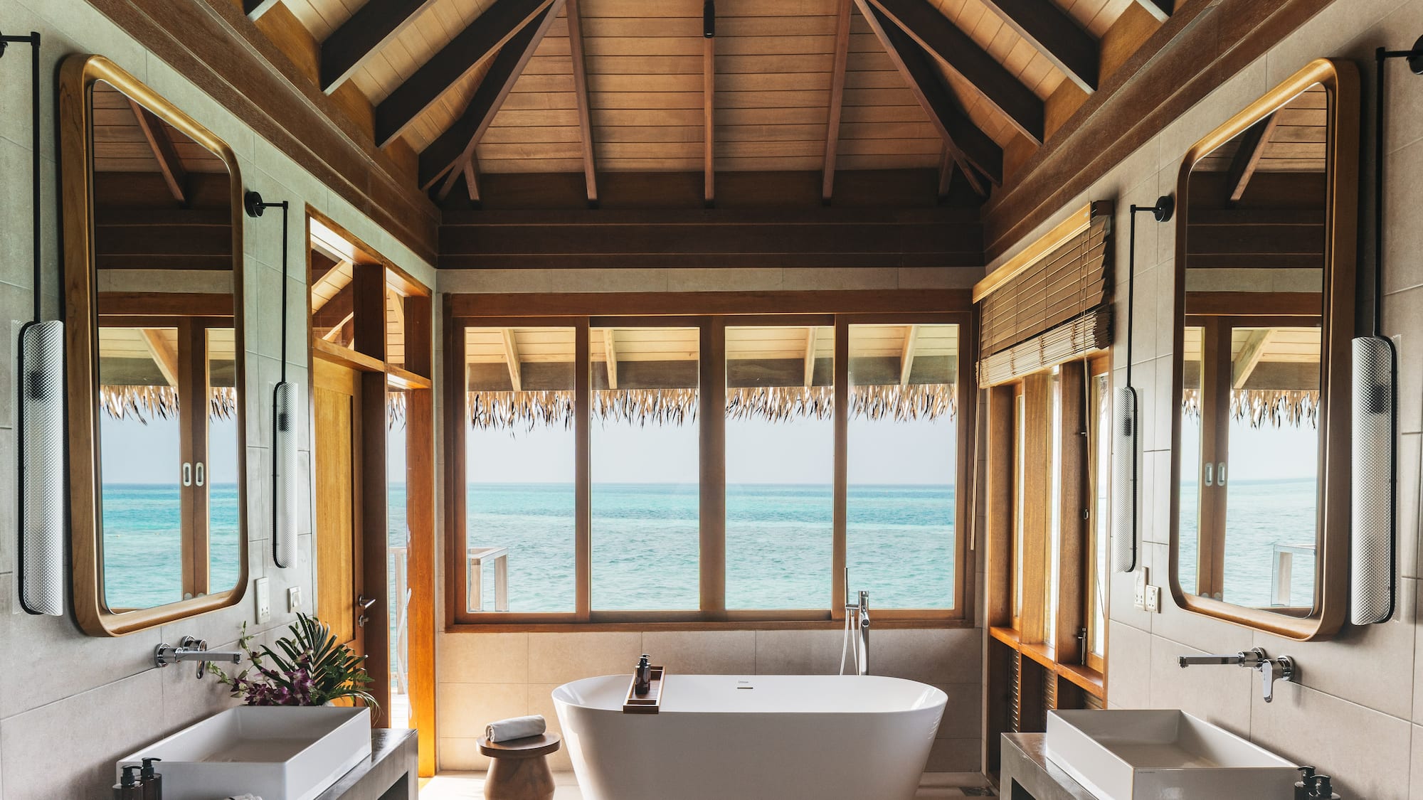a bathroom with a tub and sink