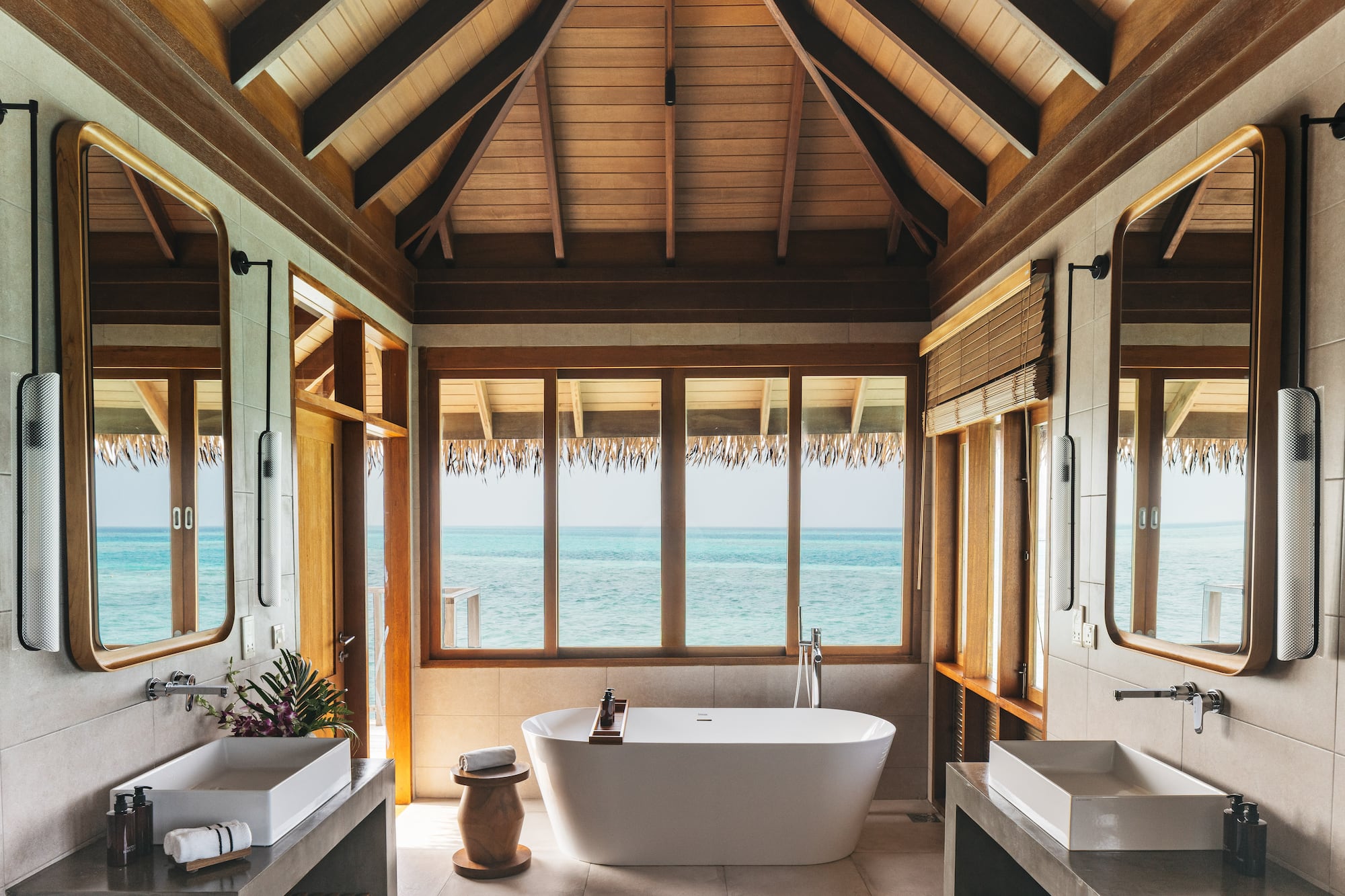 a bathroom with a tub and sink