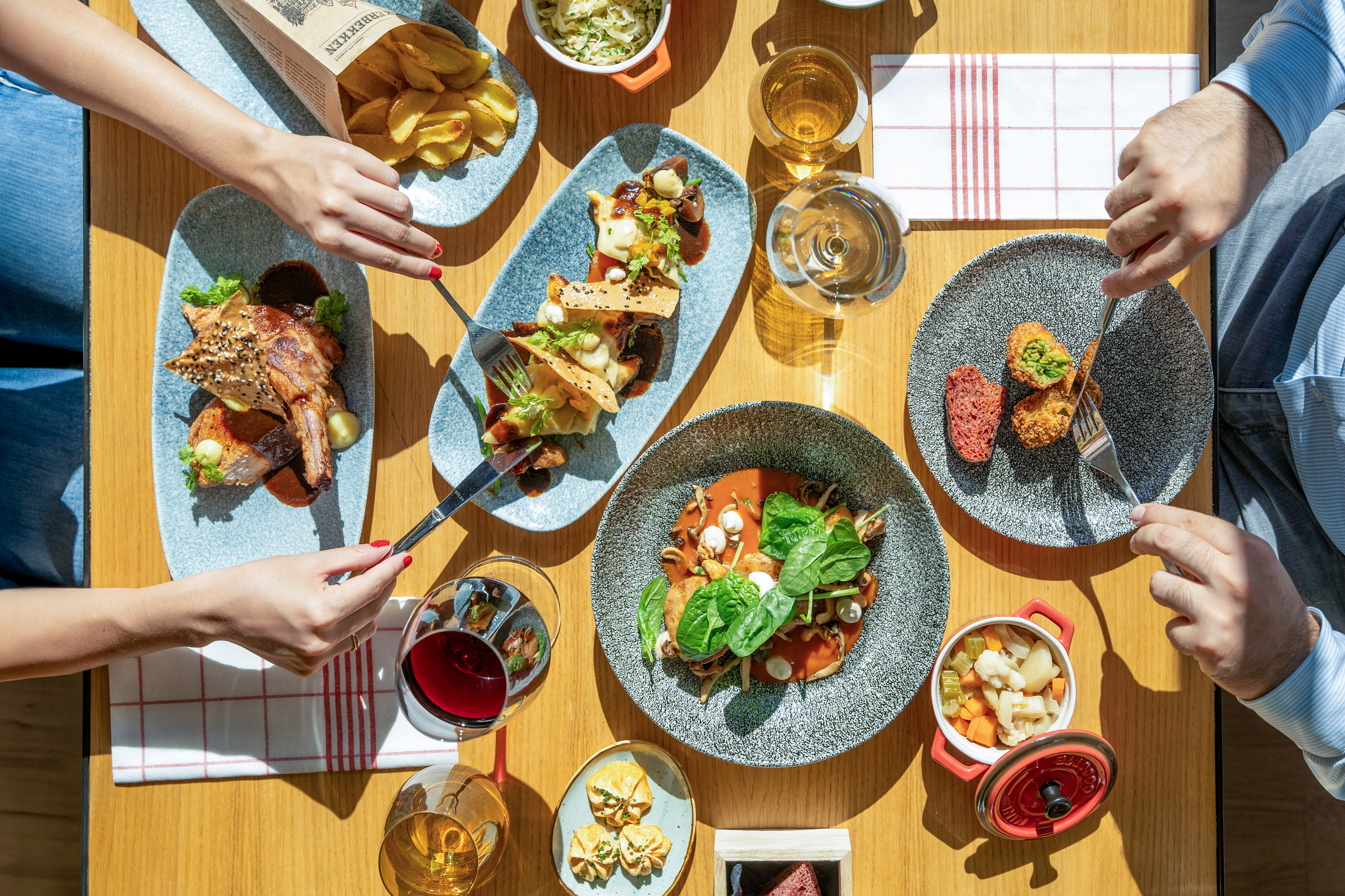 a group of people eating food on a table