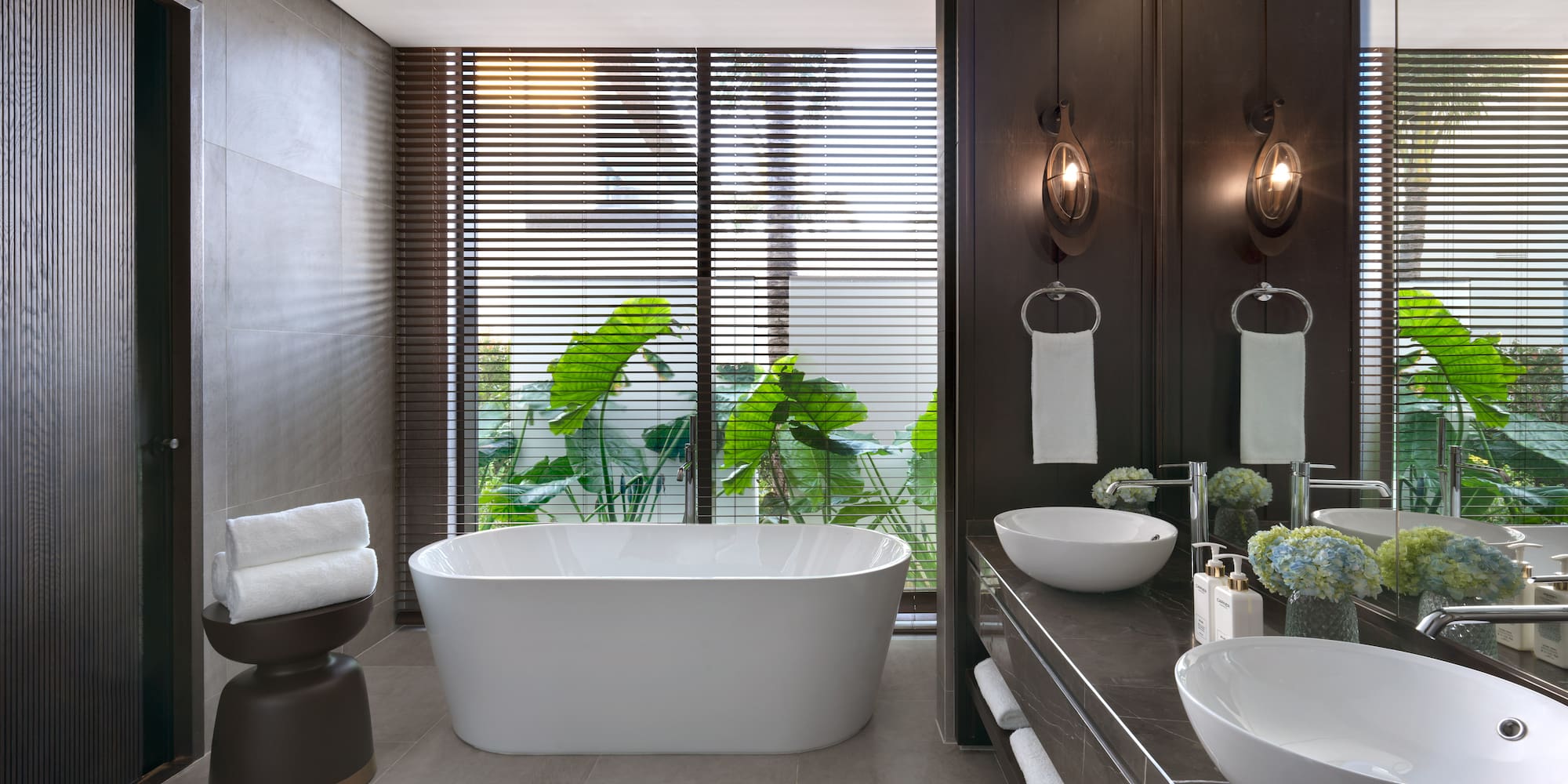 a bathroom with a tub and sink