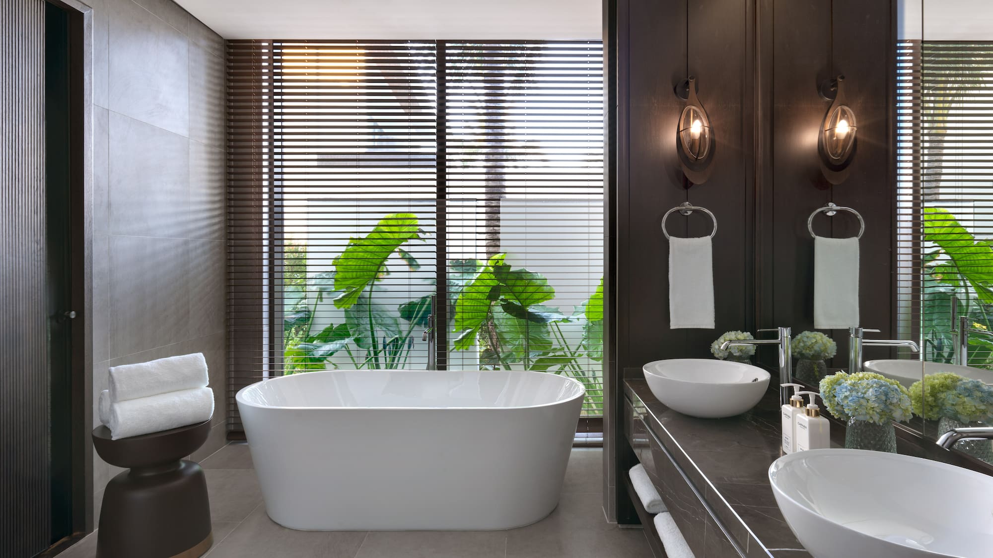 a bathroom with a tub and sink