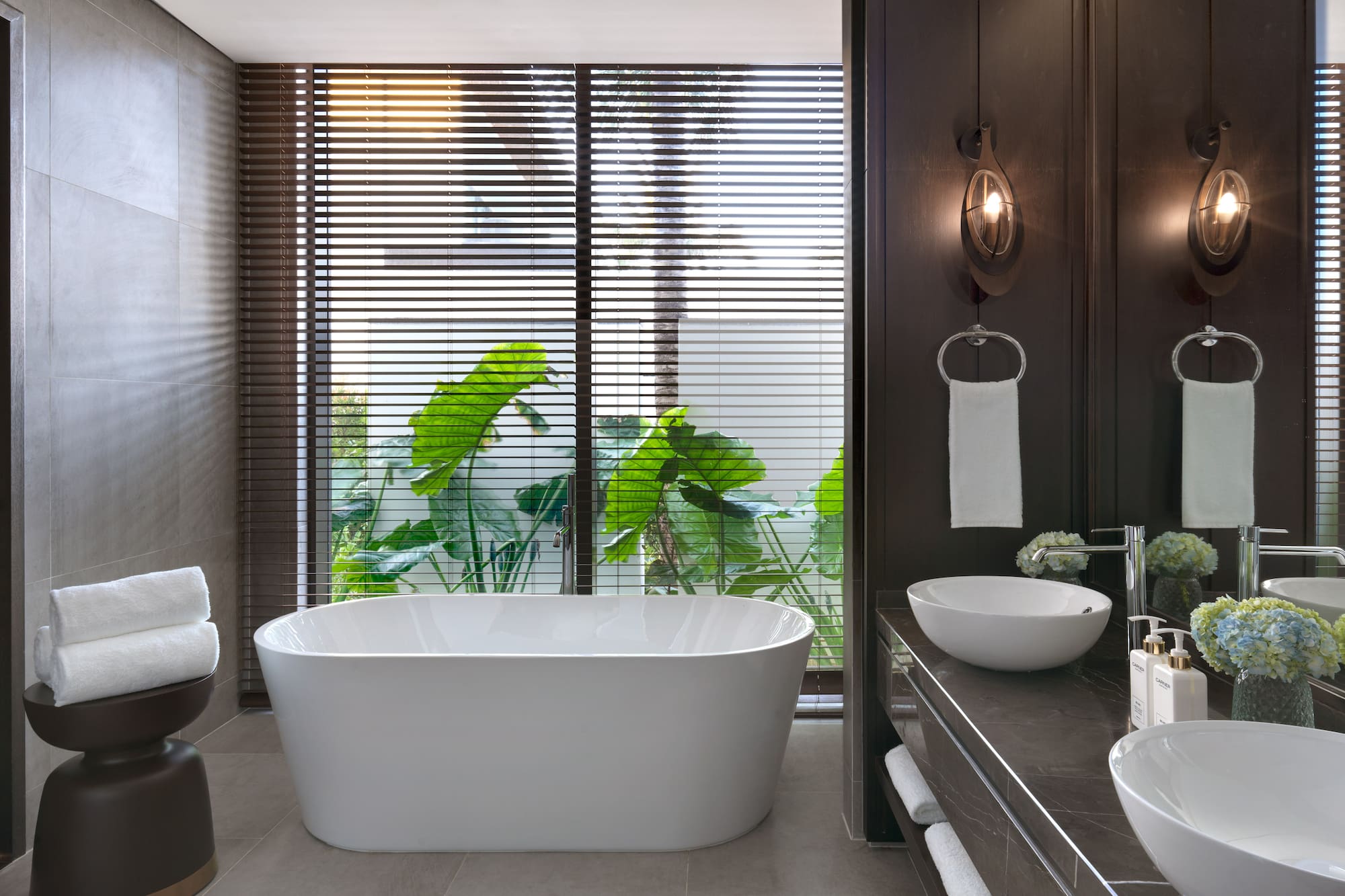 a bathroom with a tub and sink