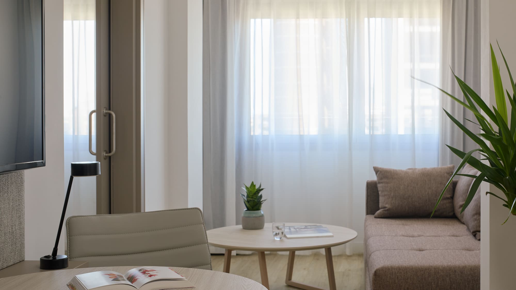 a living room with a couch and a coffee table