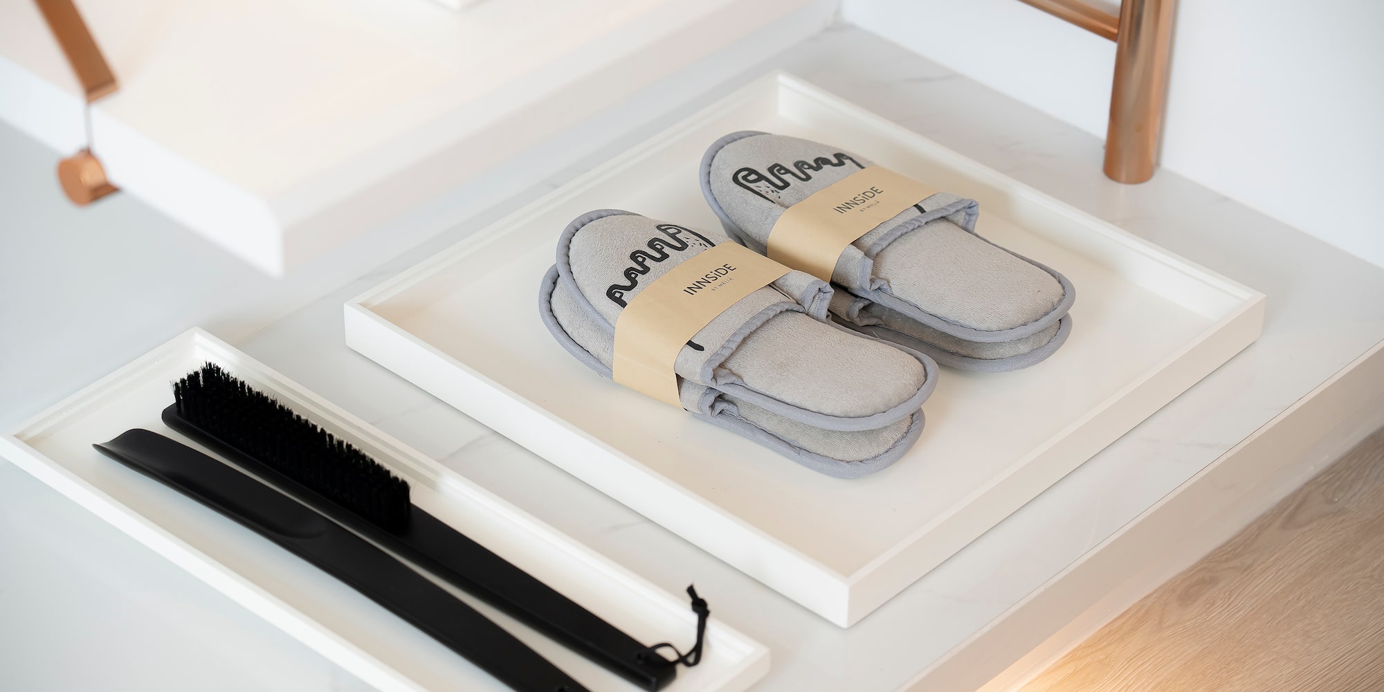 a pair of slippers on a shelf