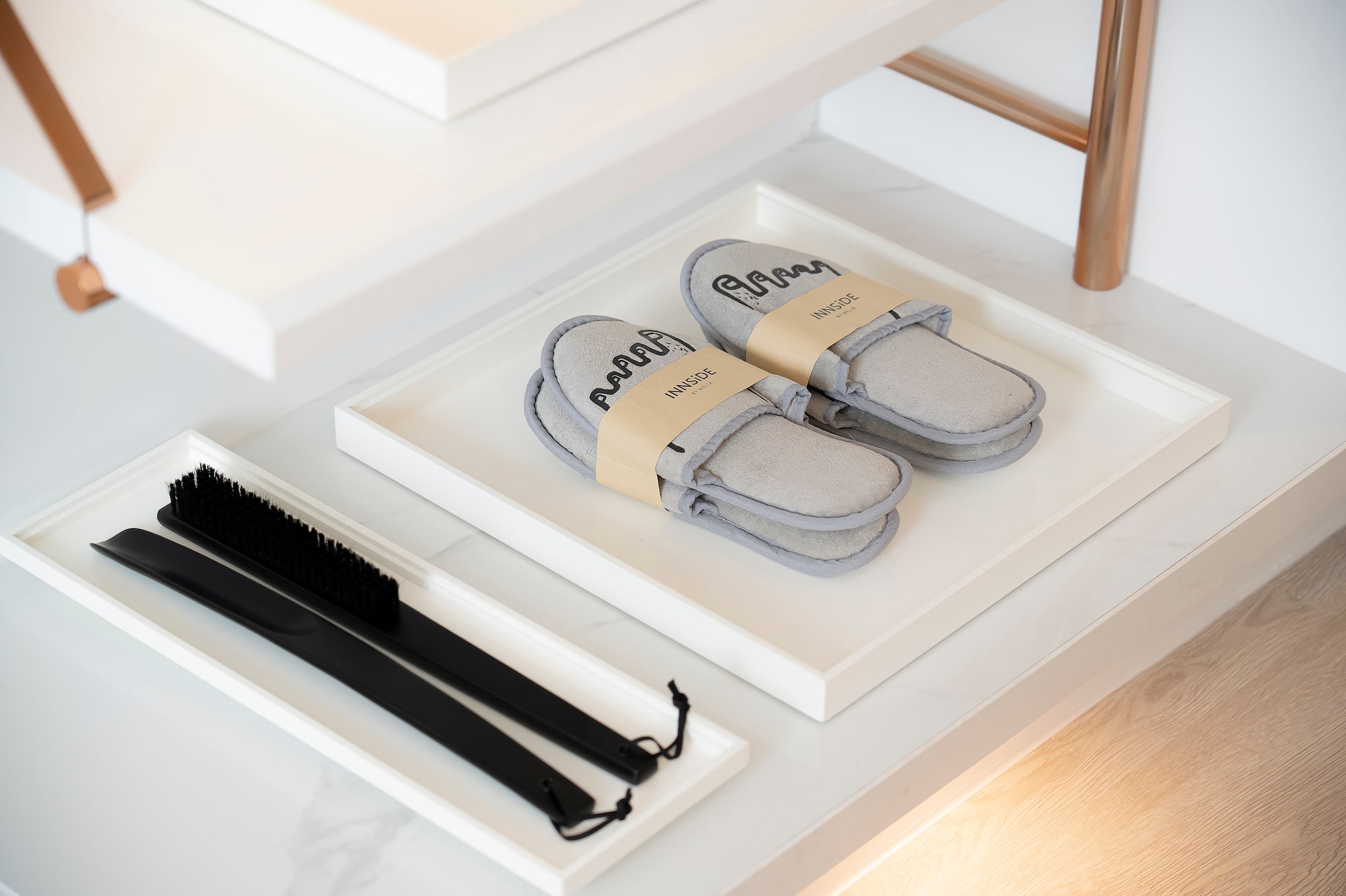 a pair of slippers on a shelf