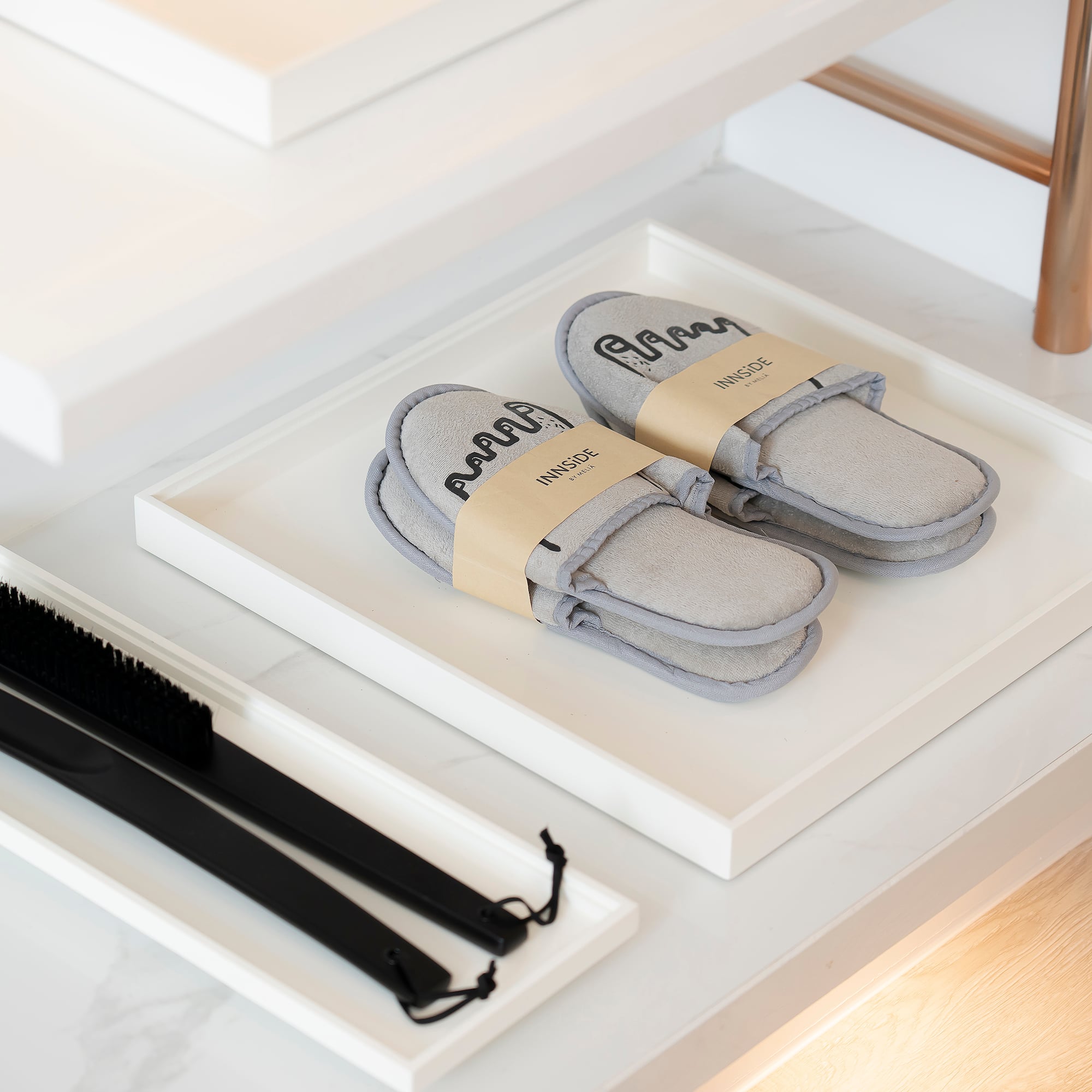 a pair of slippers on a shelf