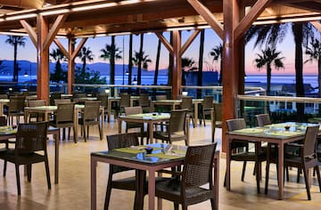 a restaurant with tables and chairs