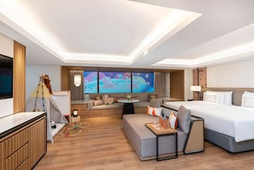 a room with a bed and a couch