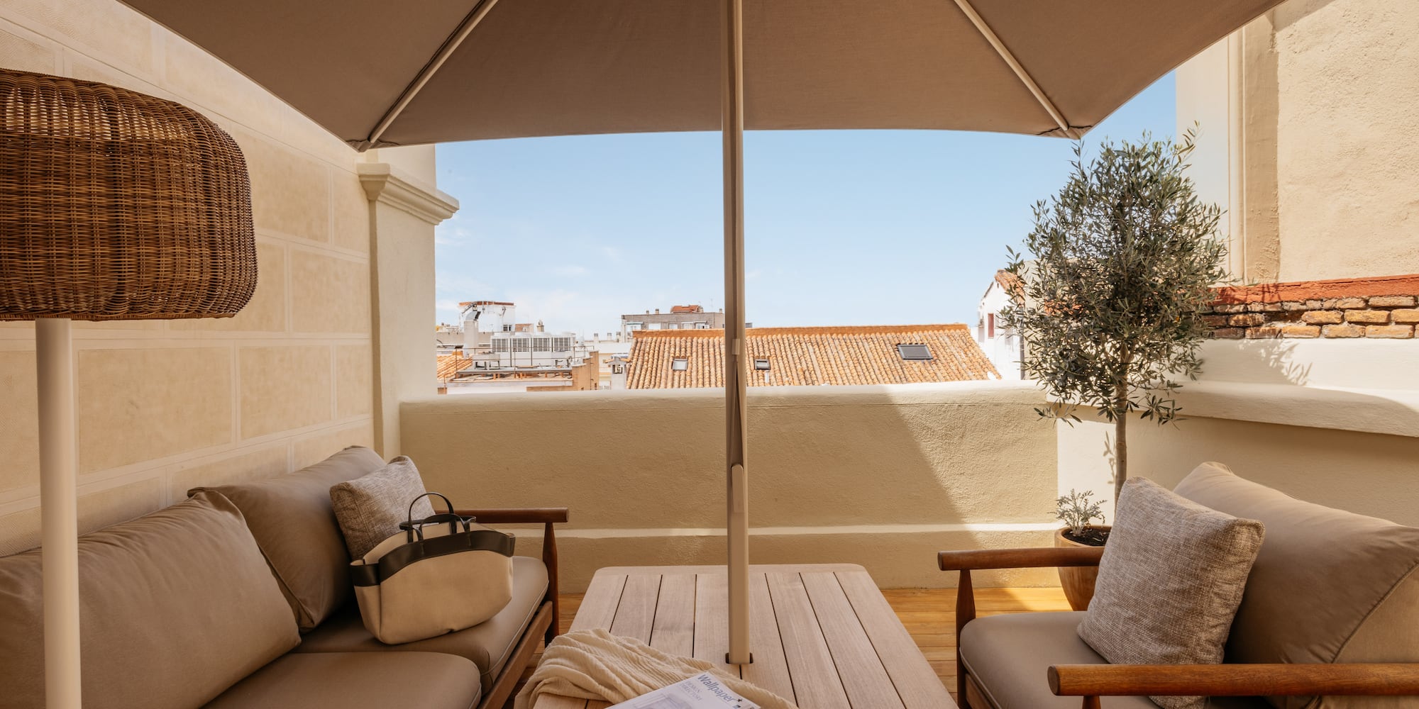 a patio with a table and chairs