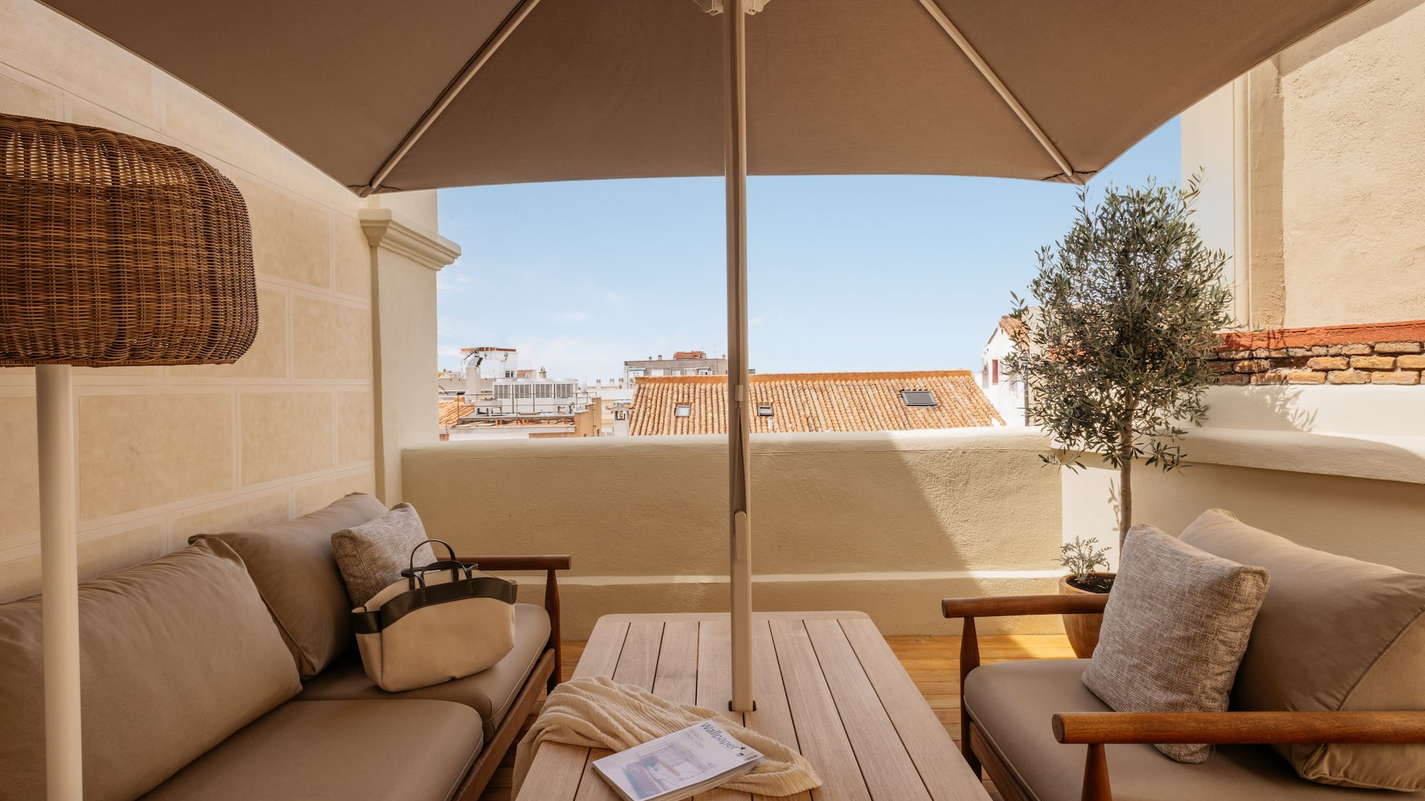 a patio with a table and chairs