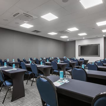 a room with tables and chairs