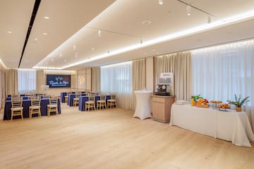 a room with tables and chairs