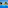 Vibrant blue swimming pool, sun loungers, traditional villa, and green trees.