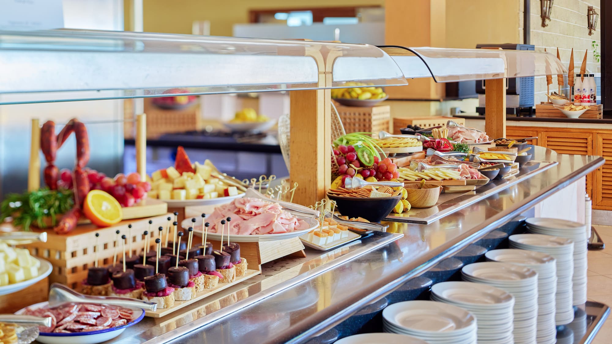 a buffet with plates of food