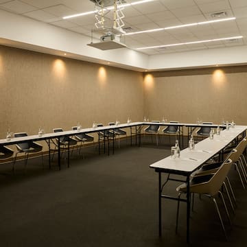 a room with tables and chairs