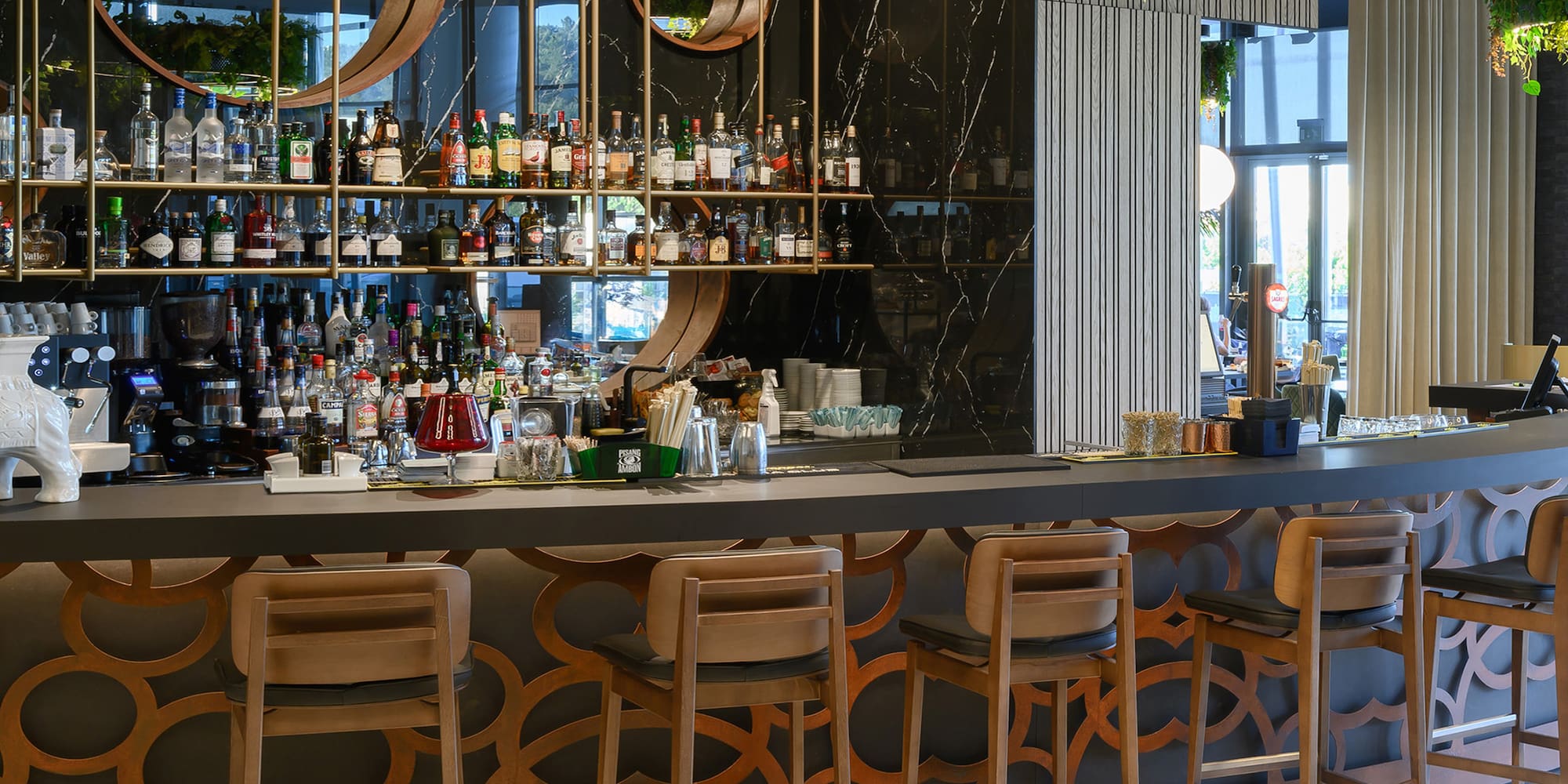 a bar with a shelf of liquor