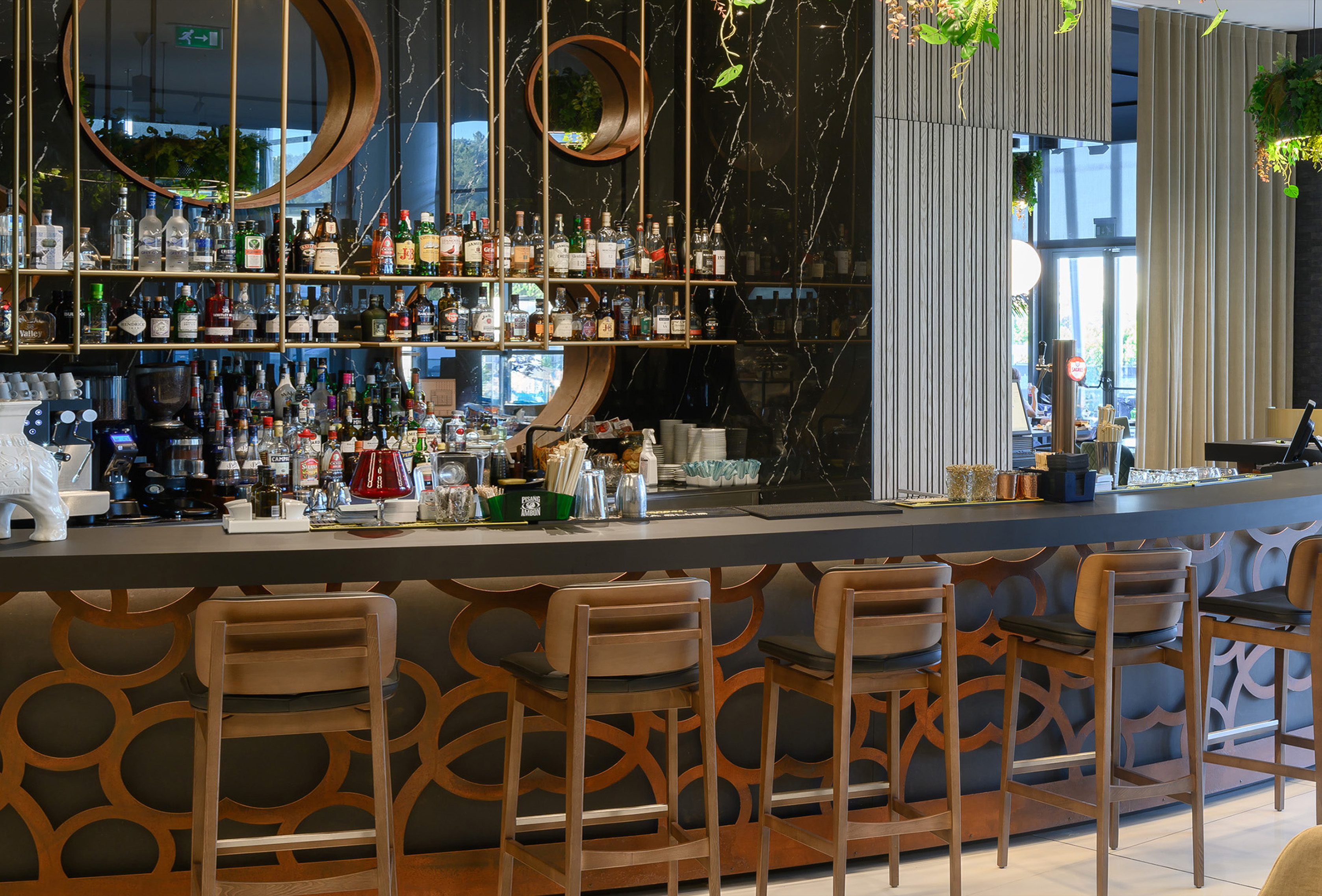 a bar with a shelf of liquor