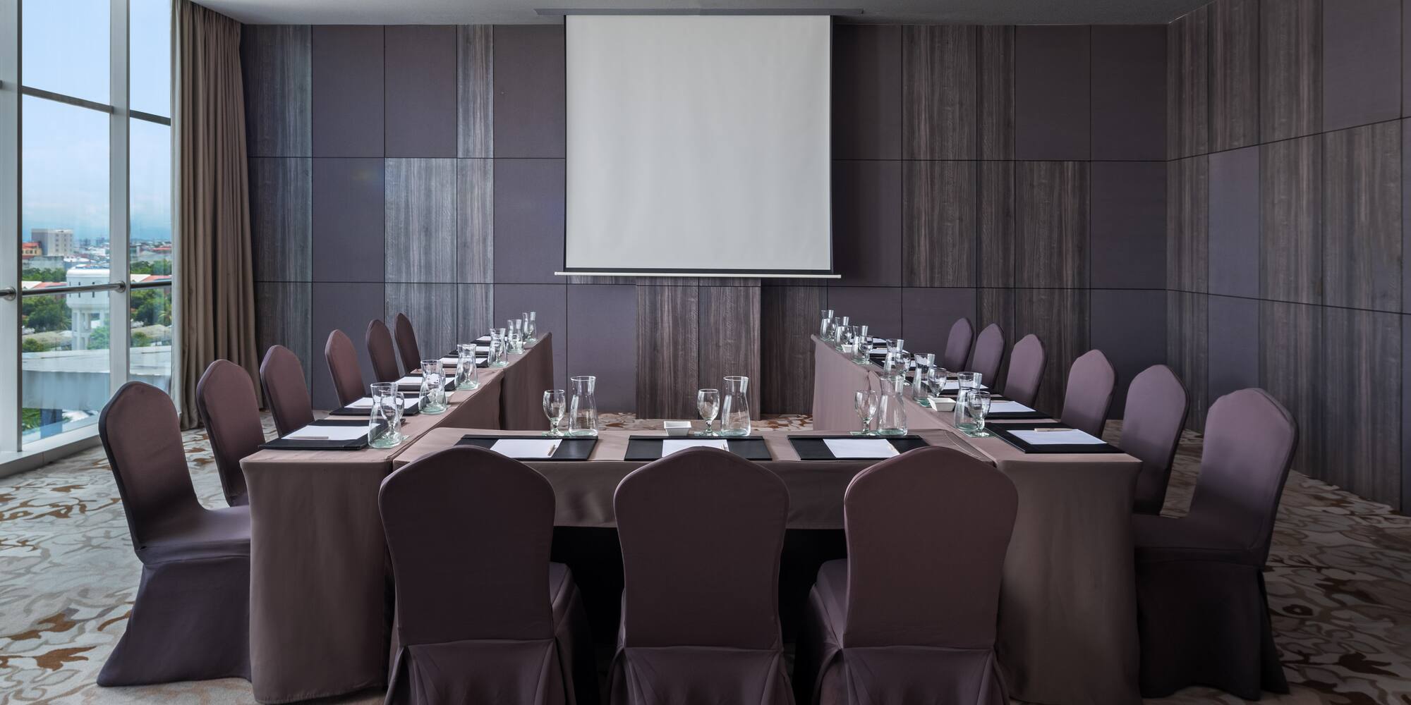 a room with a table and chairs