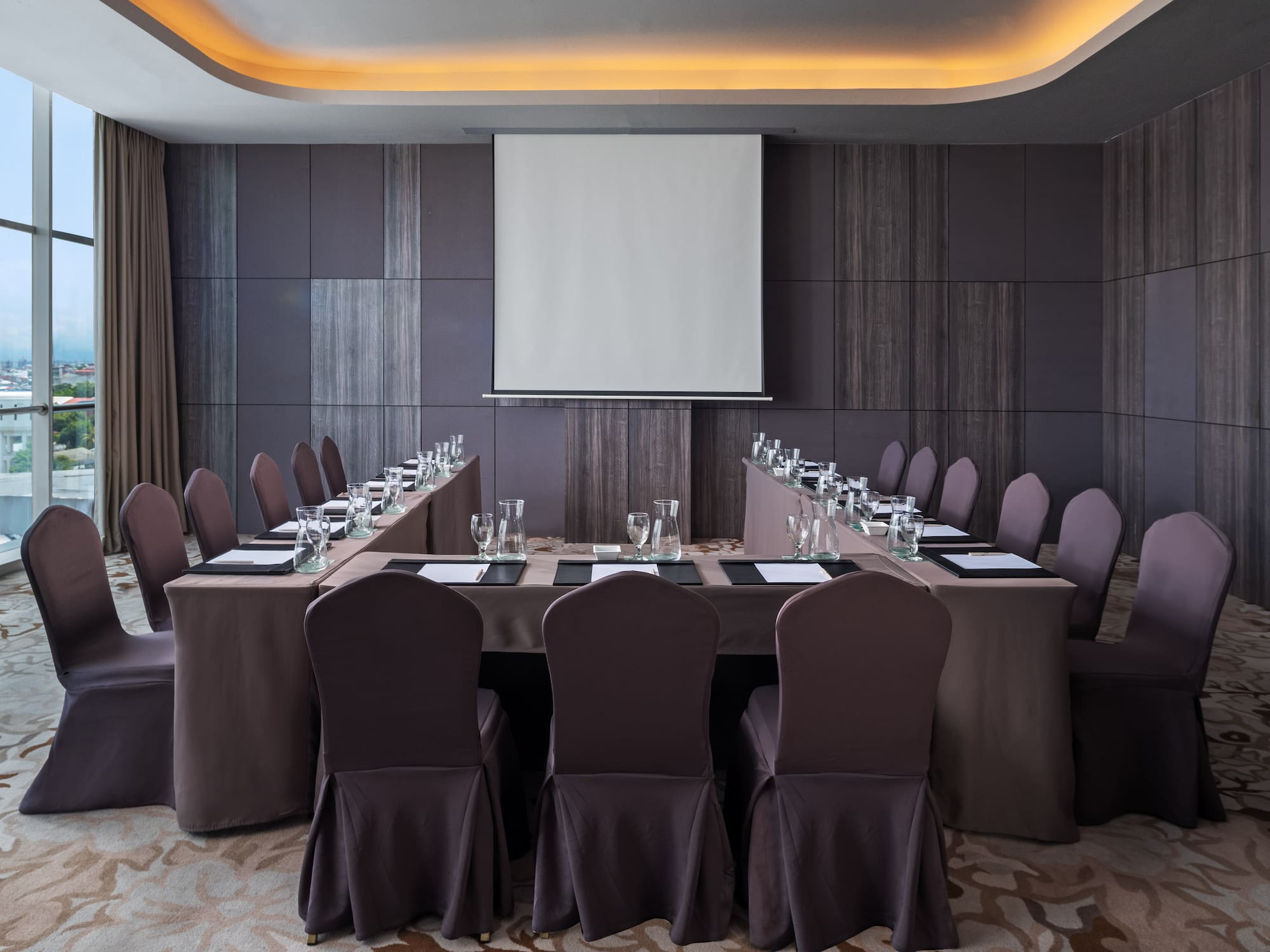 a room with a table and chairs