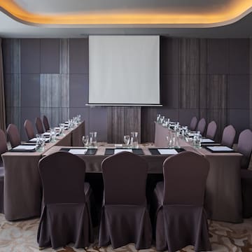 a room with a table and chairs