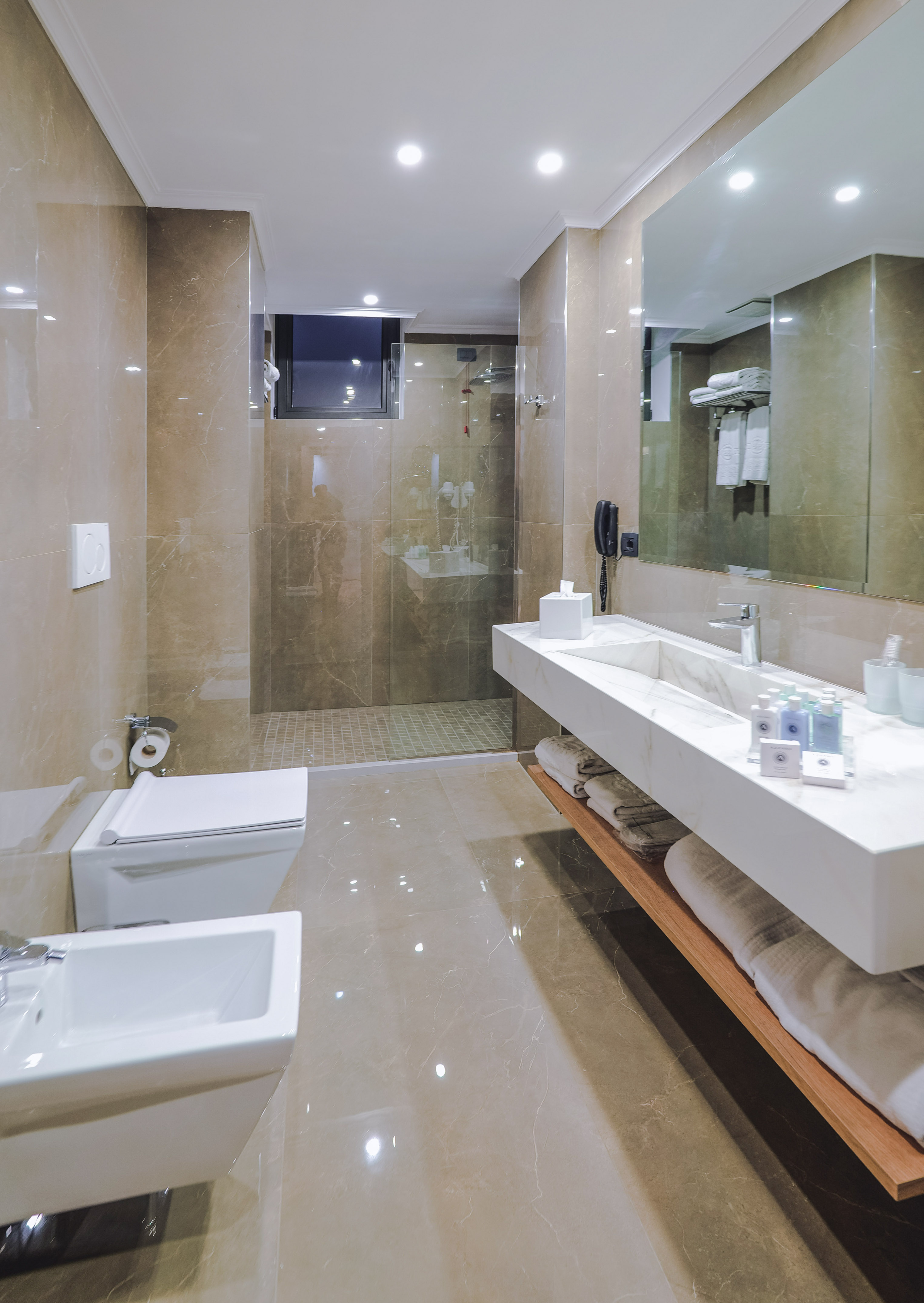 a bathroom with a mirror and sink