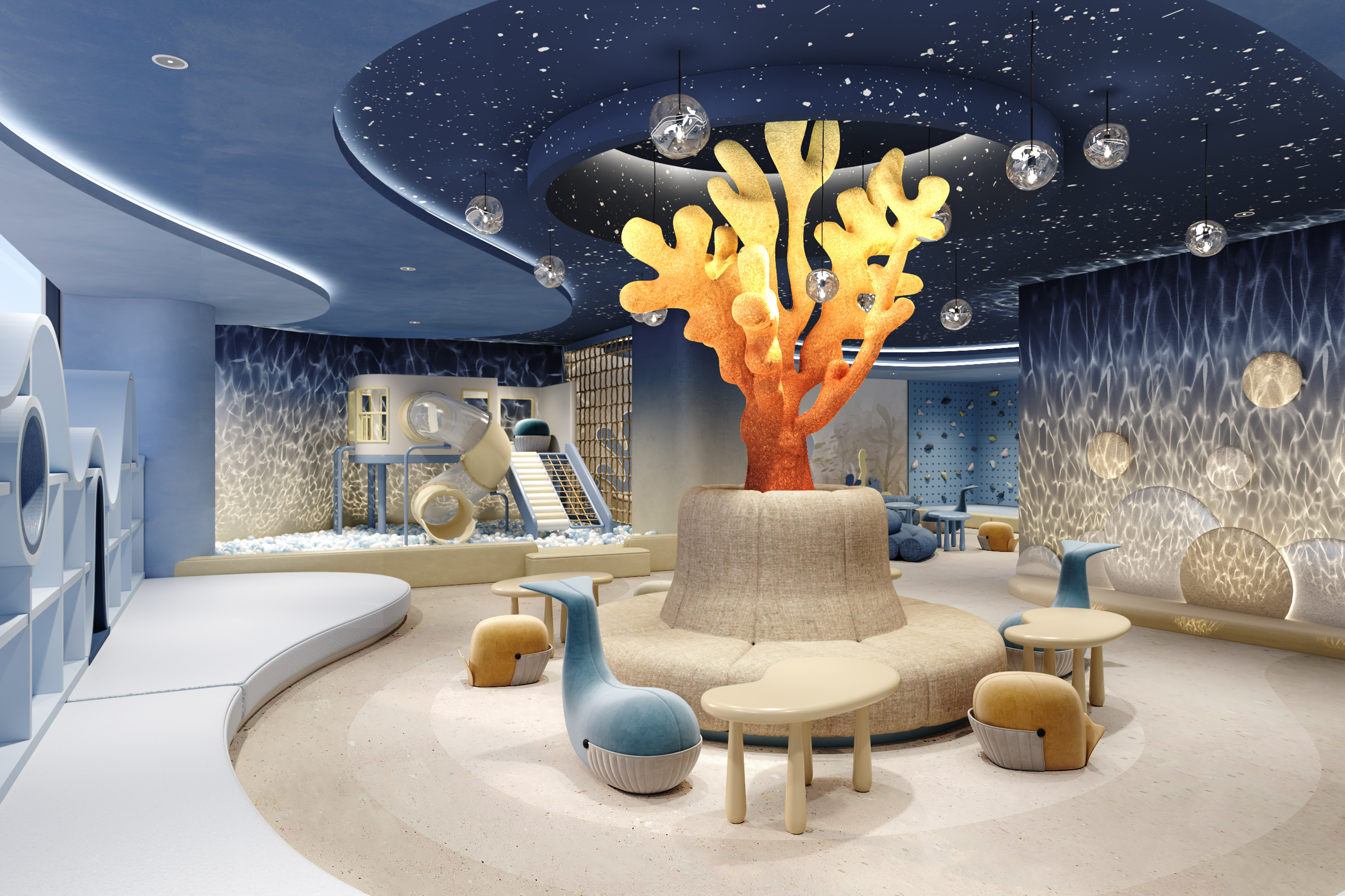 Underwater-themed kids' play area with coral, whale seats, starry ceiling.