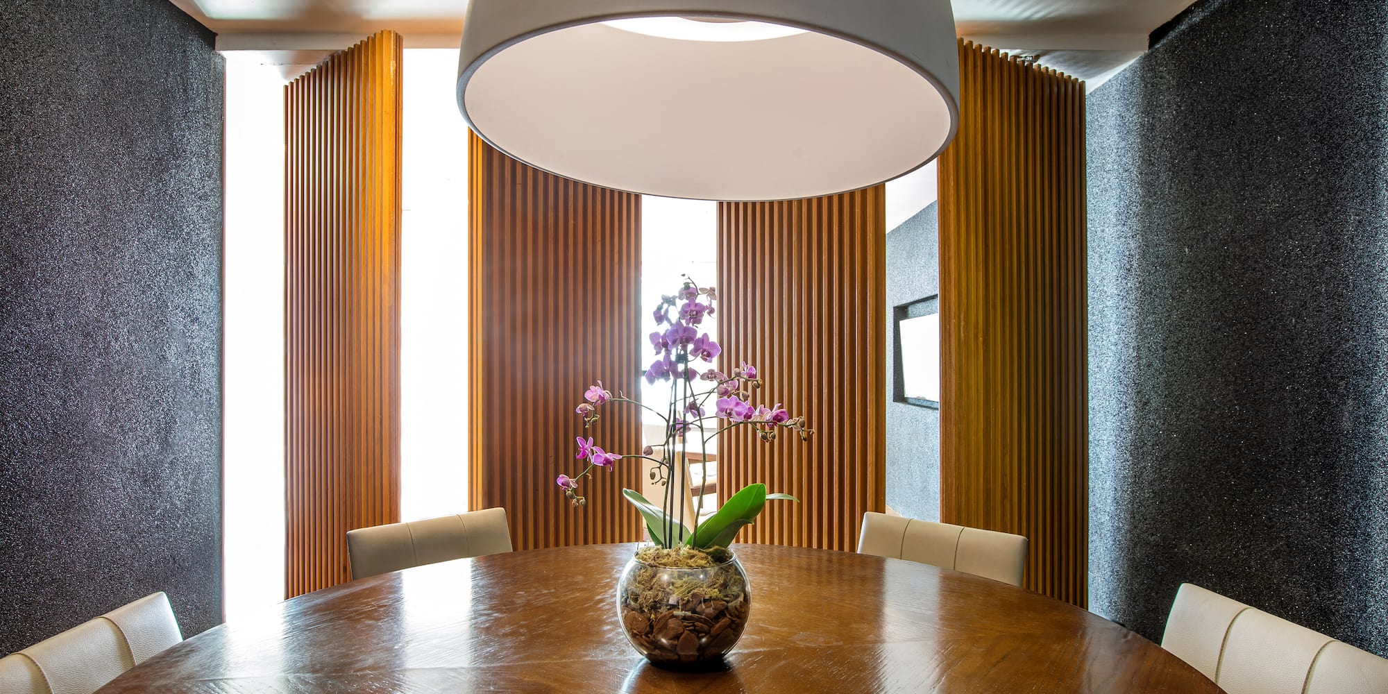 a table with a vase of flowers