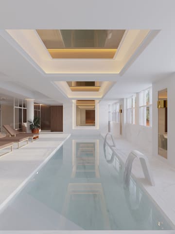 a indoor pool with a large body of water