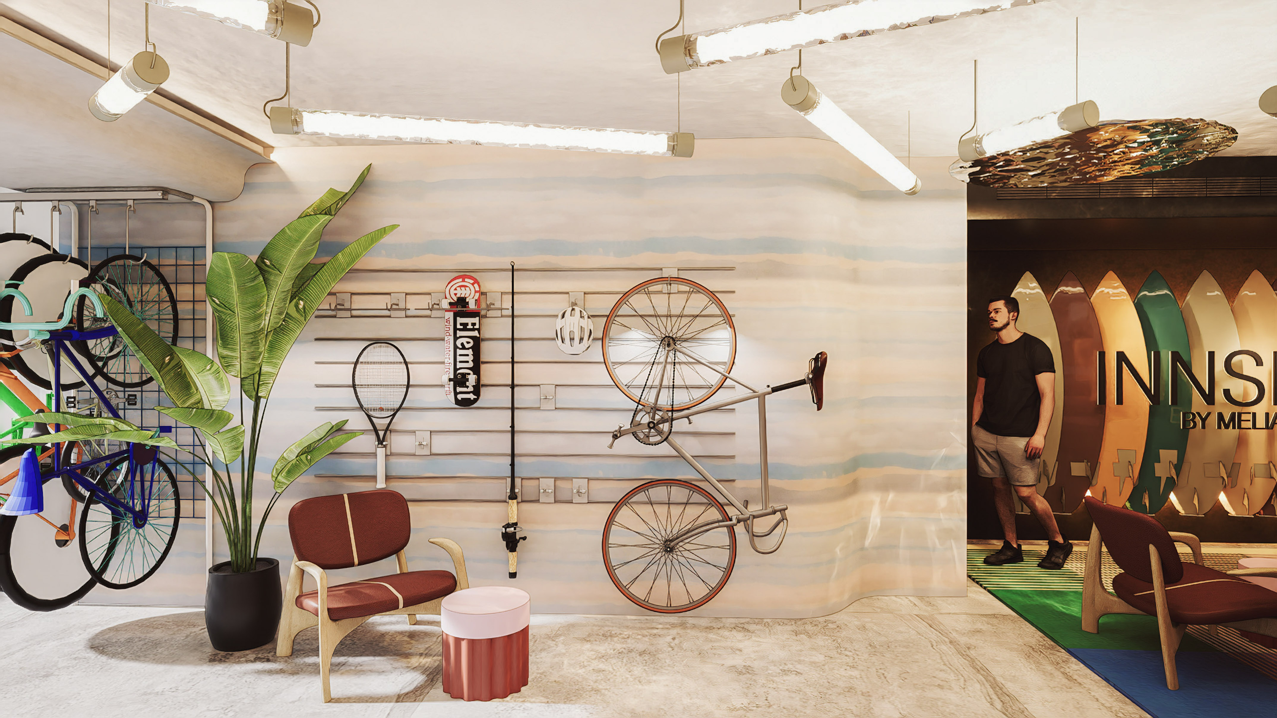 a man standing in a room with a bicycle and a chair