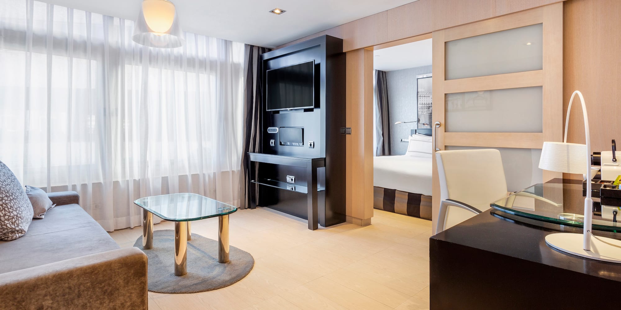 a room with a tv and a couch