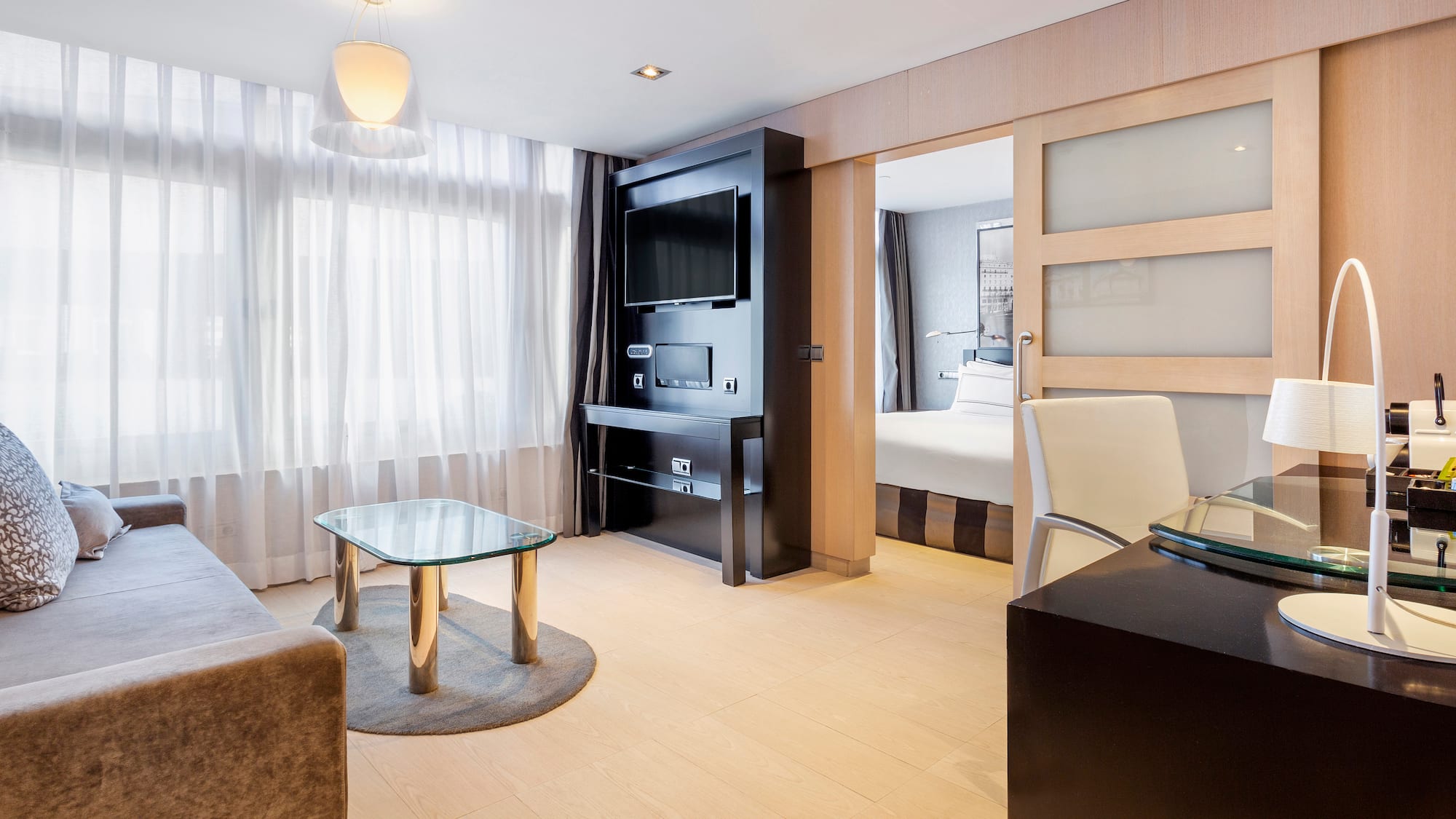 a room with a tv and a couch