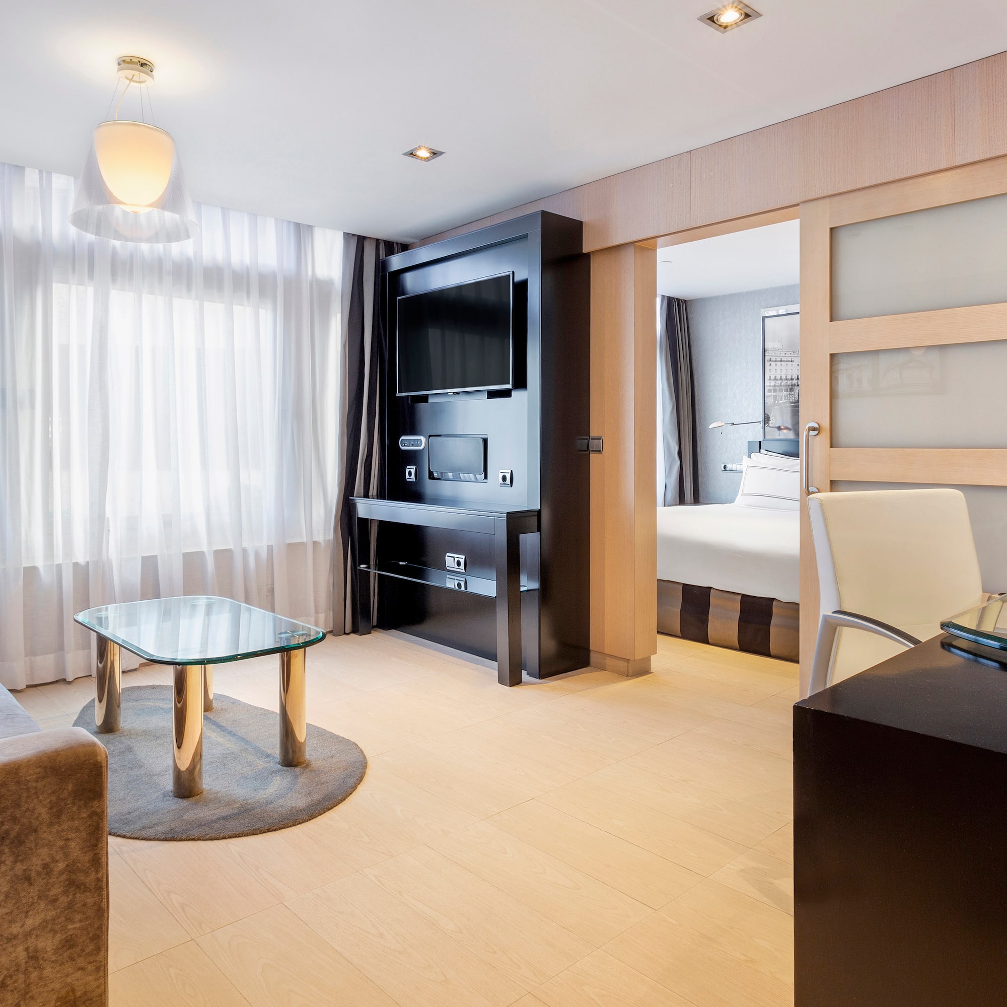 a room with a tv and a couch