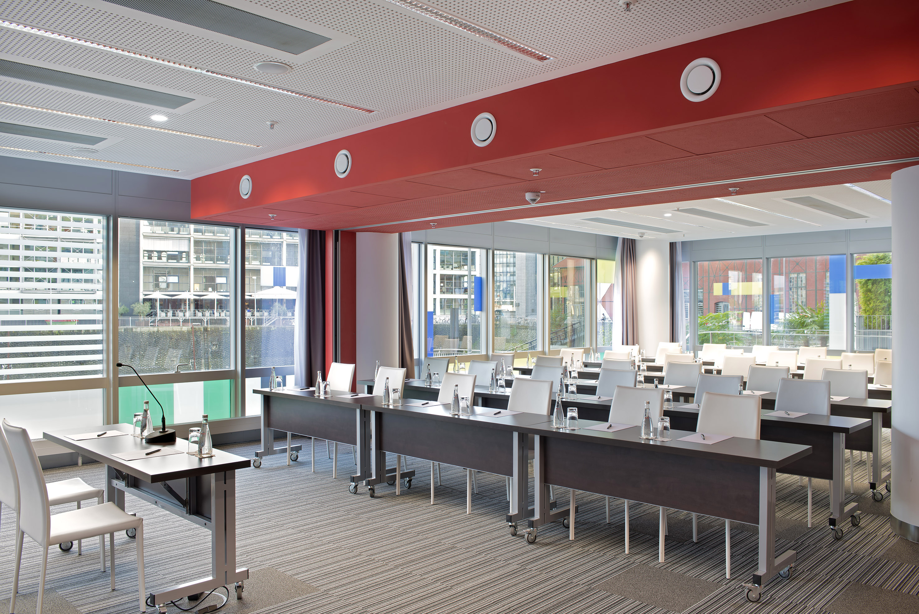 a room with tables and chairs