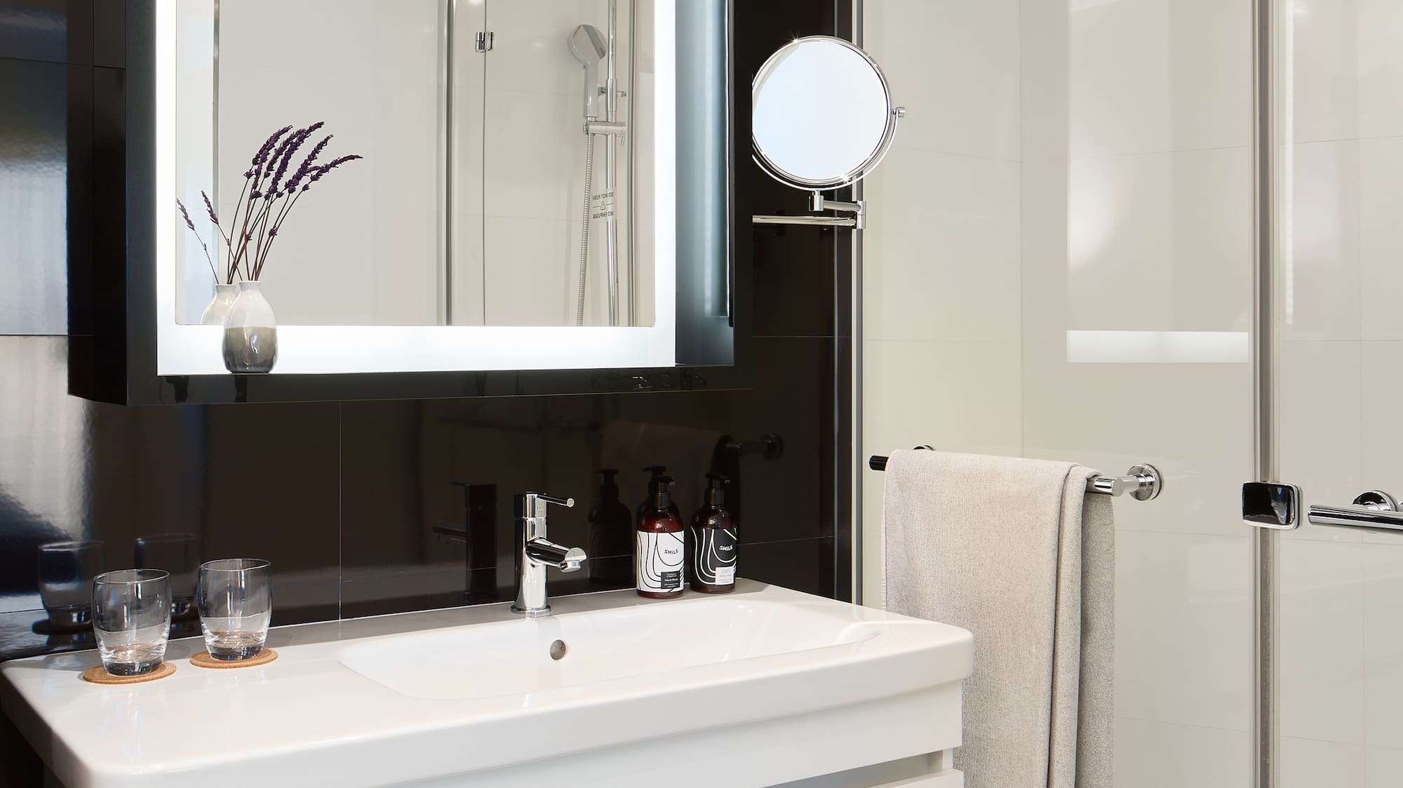 a bathroom with a mirror and a sink