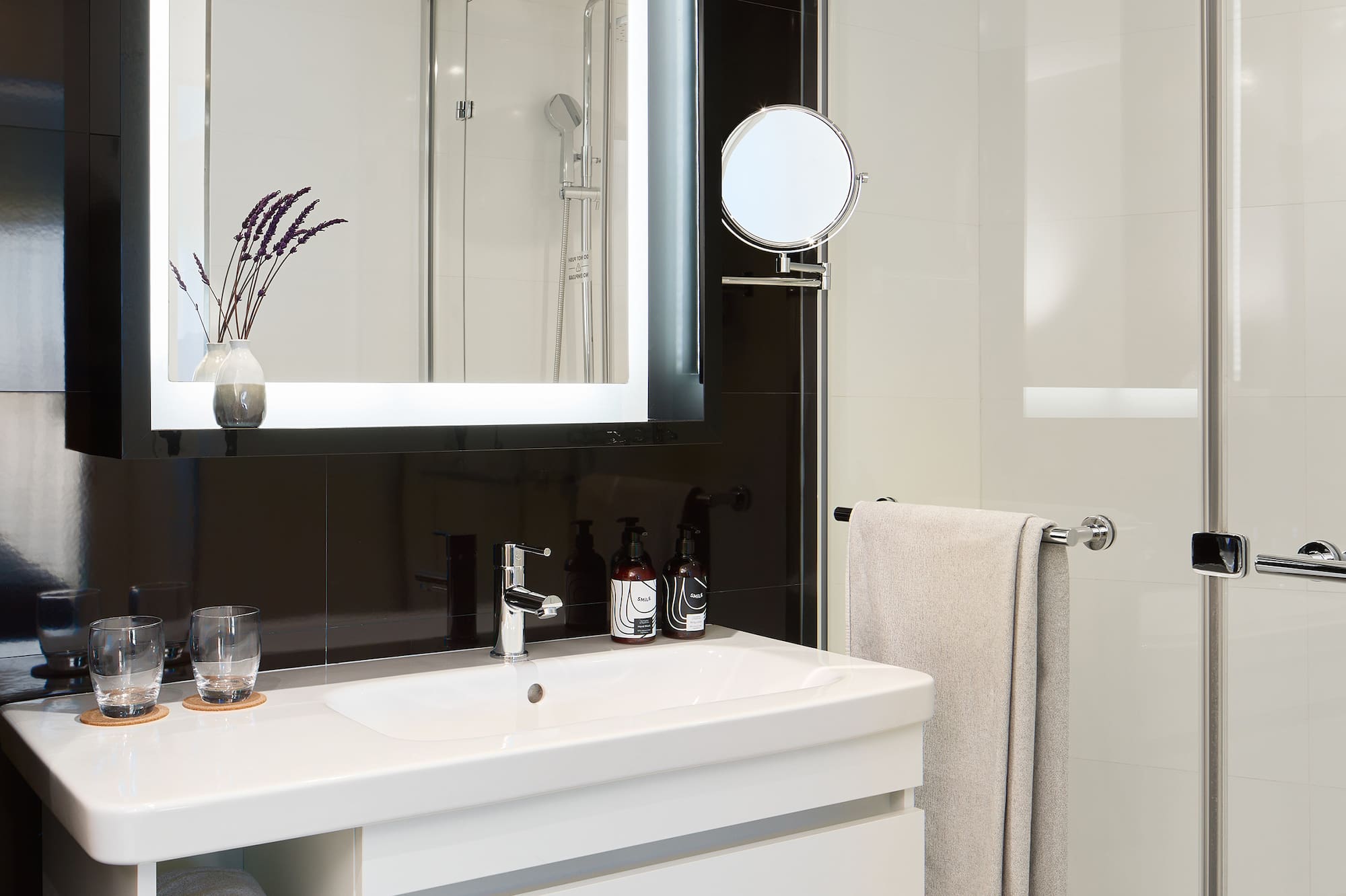 a bathroom with a mirror and a sink