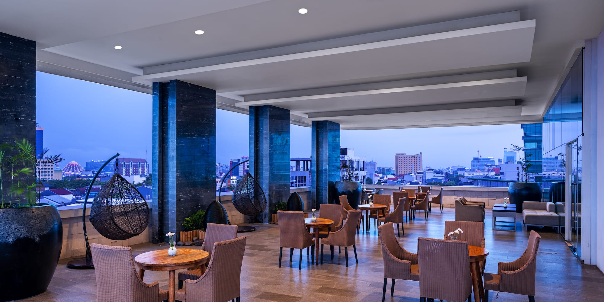 a room with chairs and tables