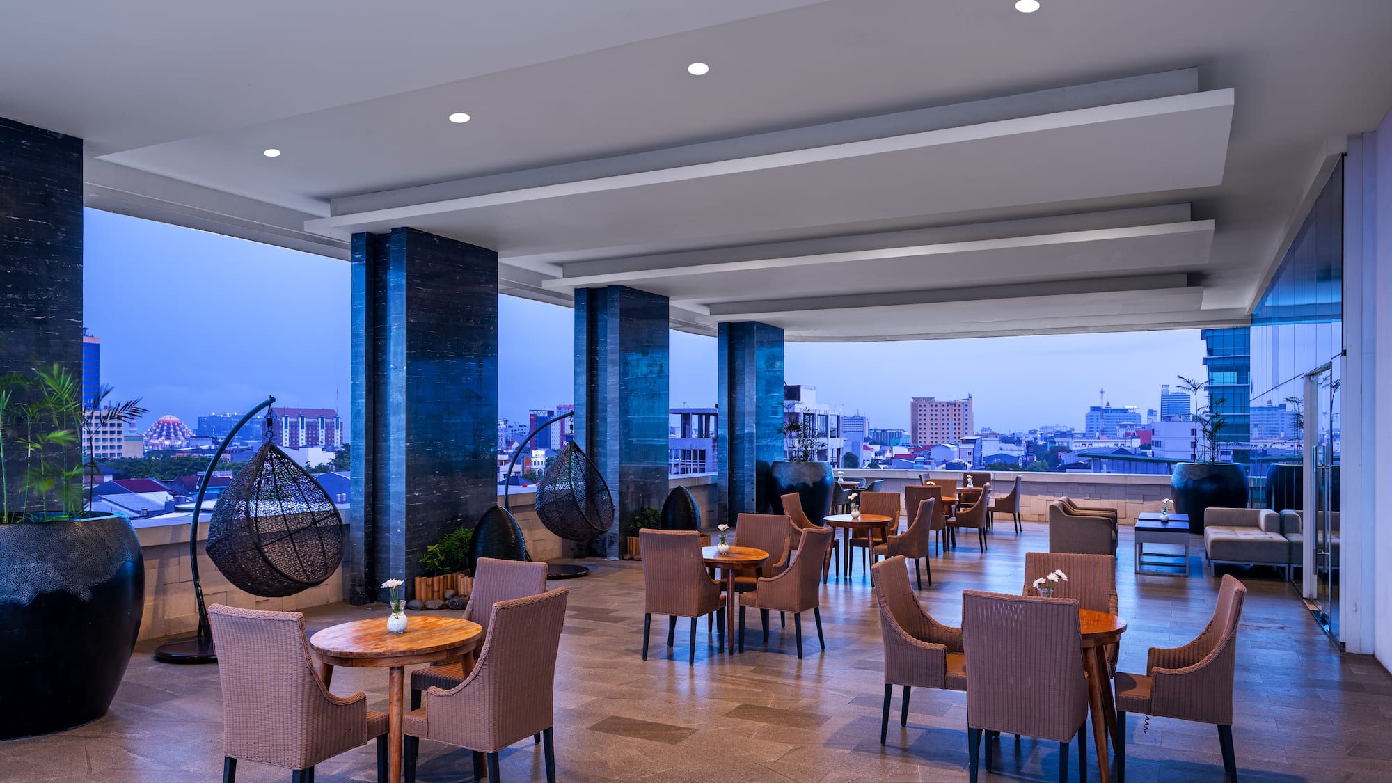 a room with chairs and tables