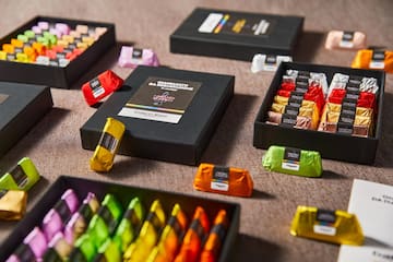 a group of different colored chocolates