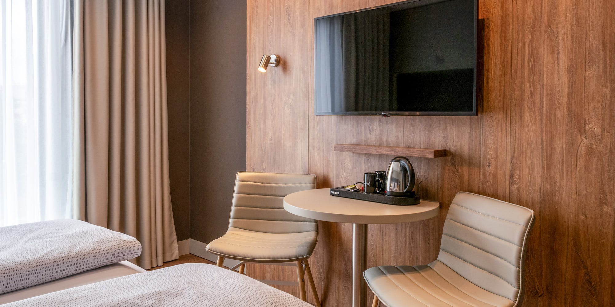 a room with a tv and a table