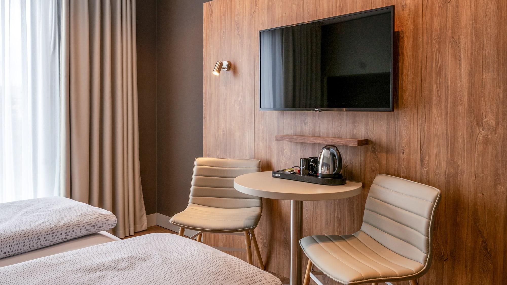 a room with a tv and a table