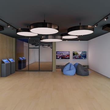 a room with a large screen and a large glass door