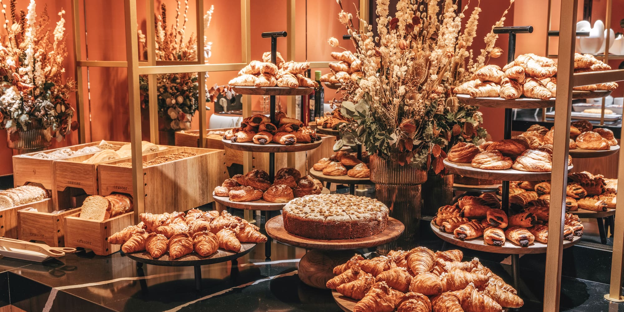 a display of pastries and bread
