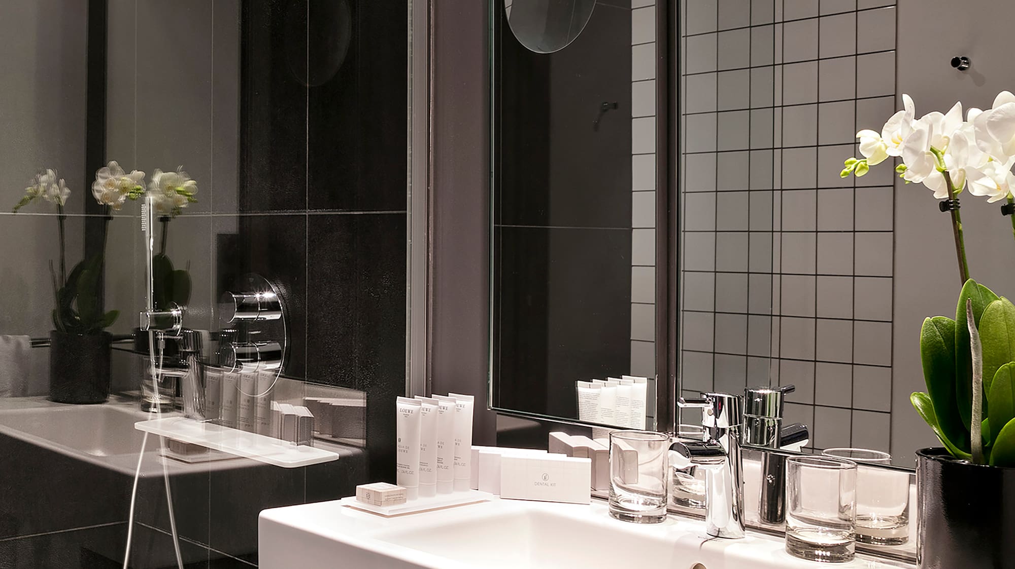 a bathroom with a sink and shower