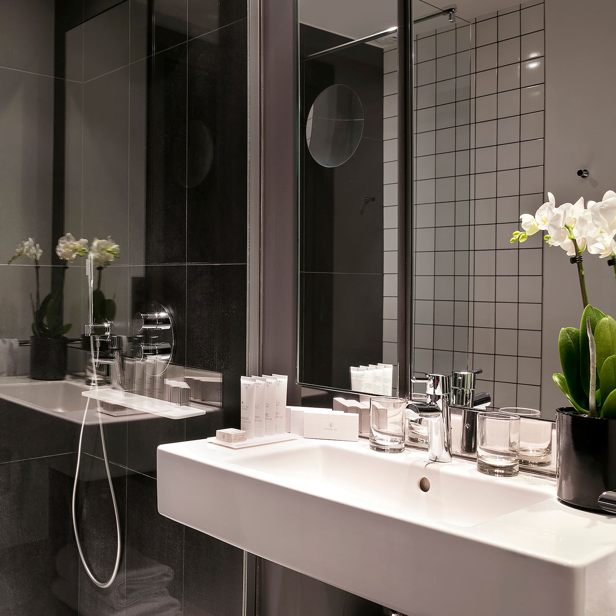 a bathroom with a sink and shower
