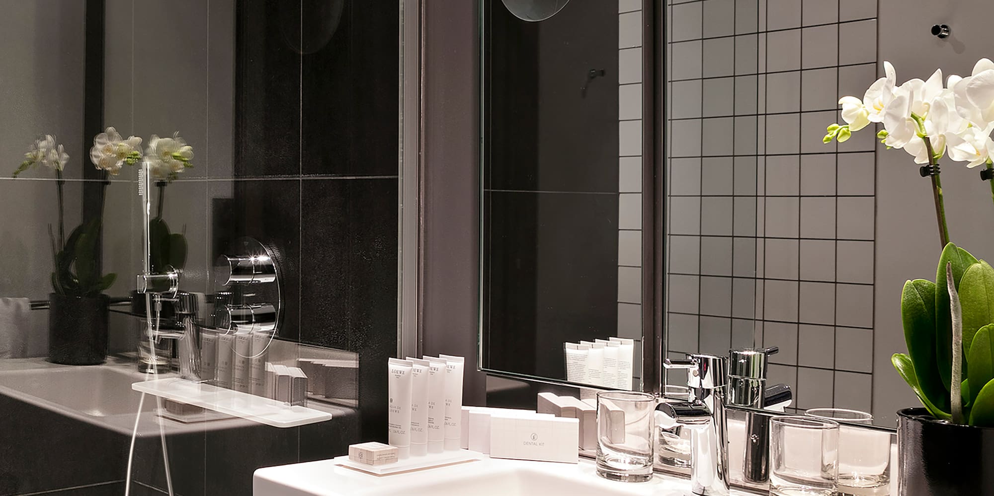 a bathroom with a sink and shower