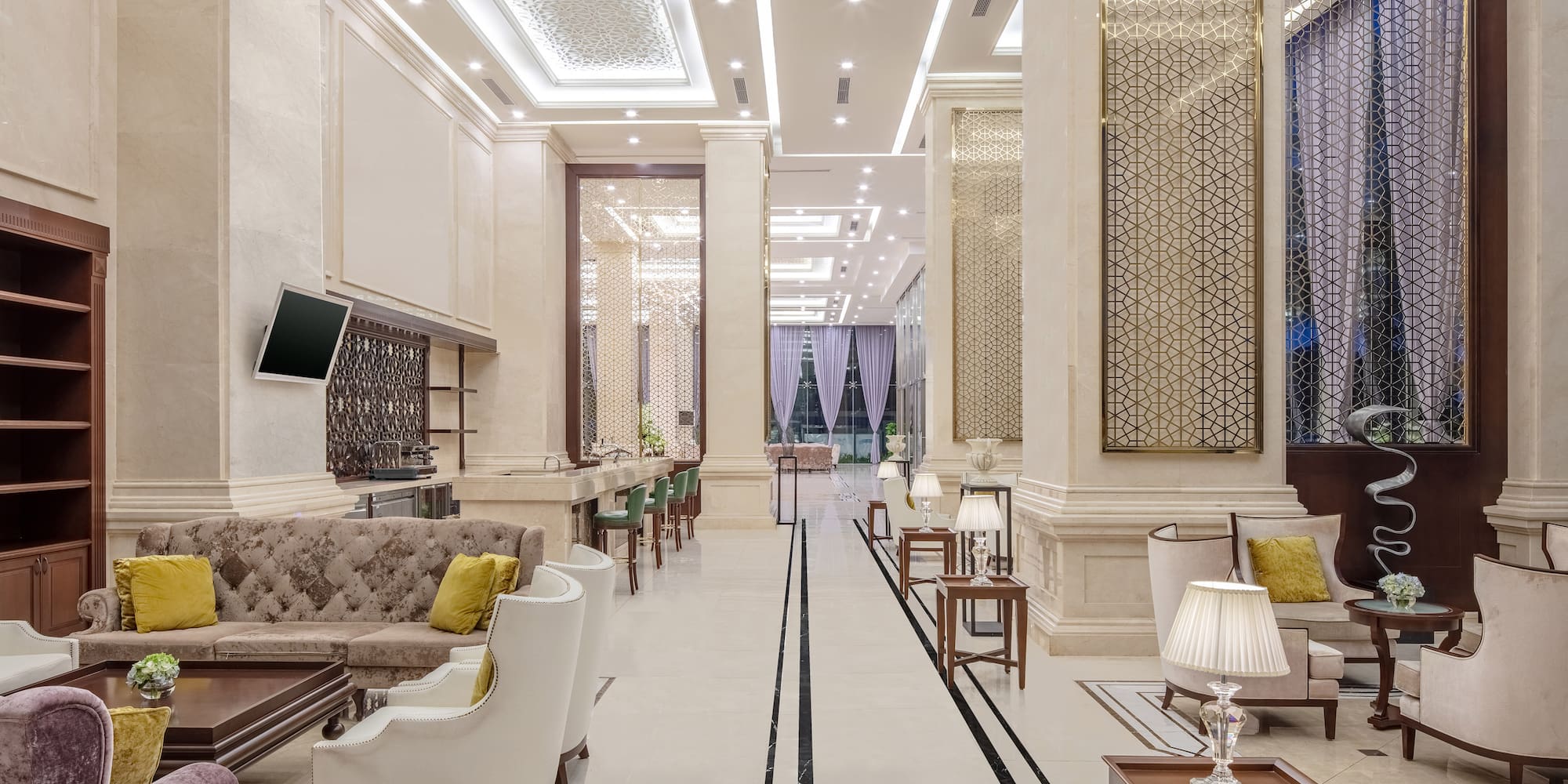 a room with a large wall and a television