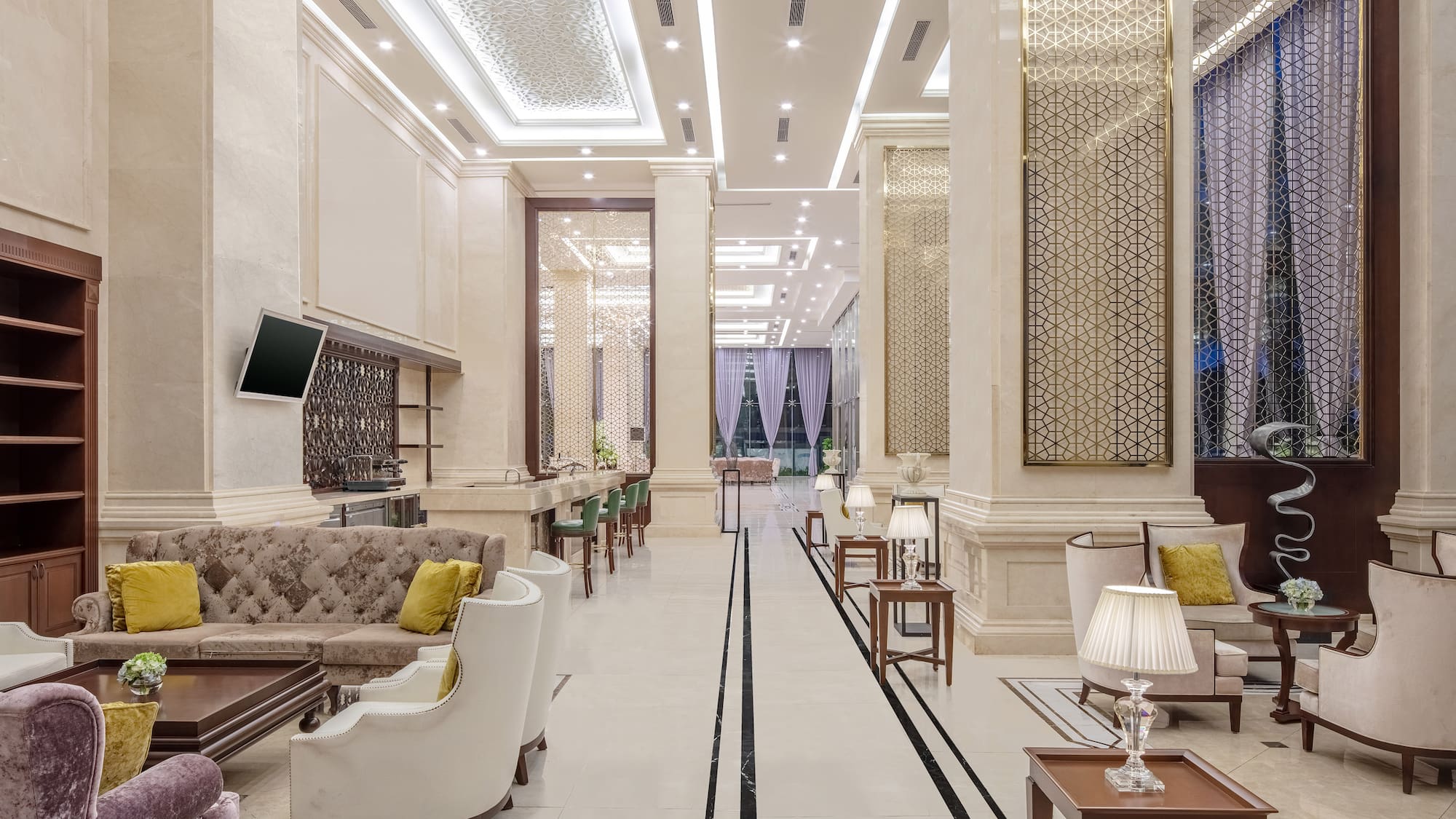 a room with a large wall and a television