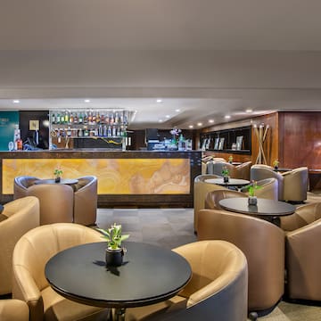 a room with tables and chairs